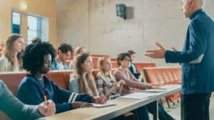 Professor Holding Lecture to a Multi Ethnic Group of Students. Smart Young People Studying at the University.